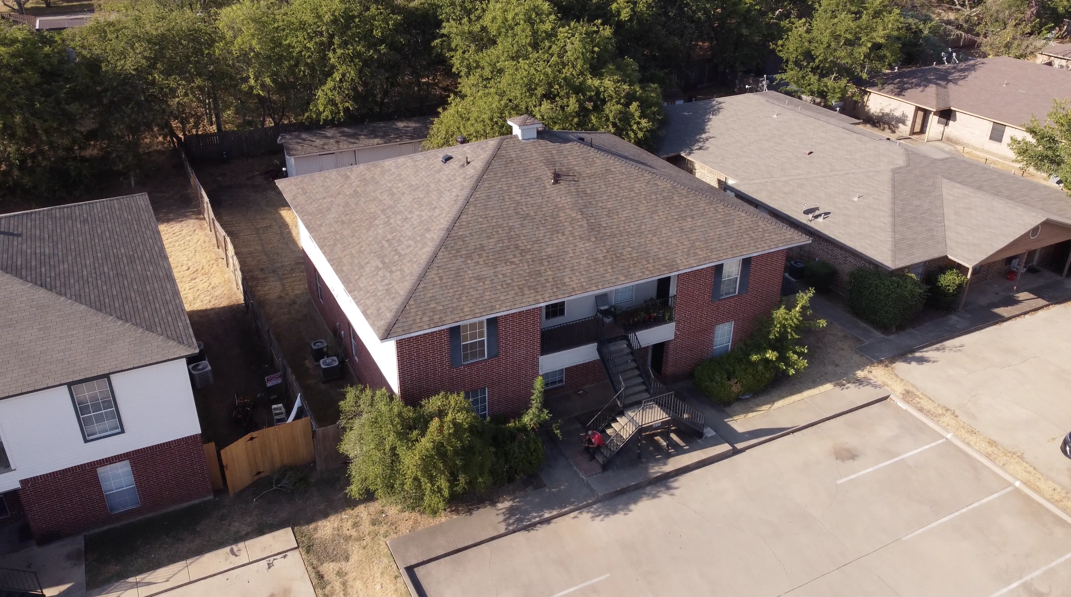 41 Roofing crew completing a roof replacement